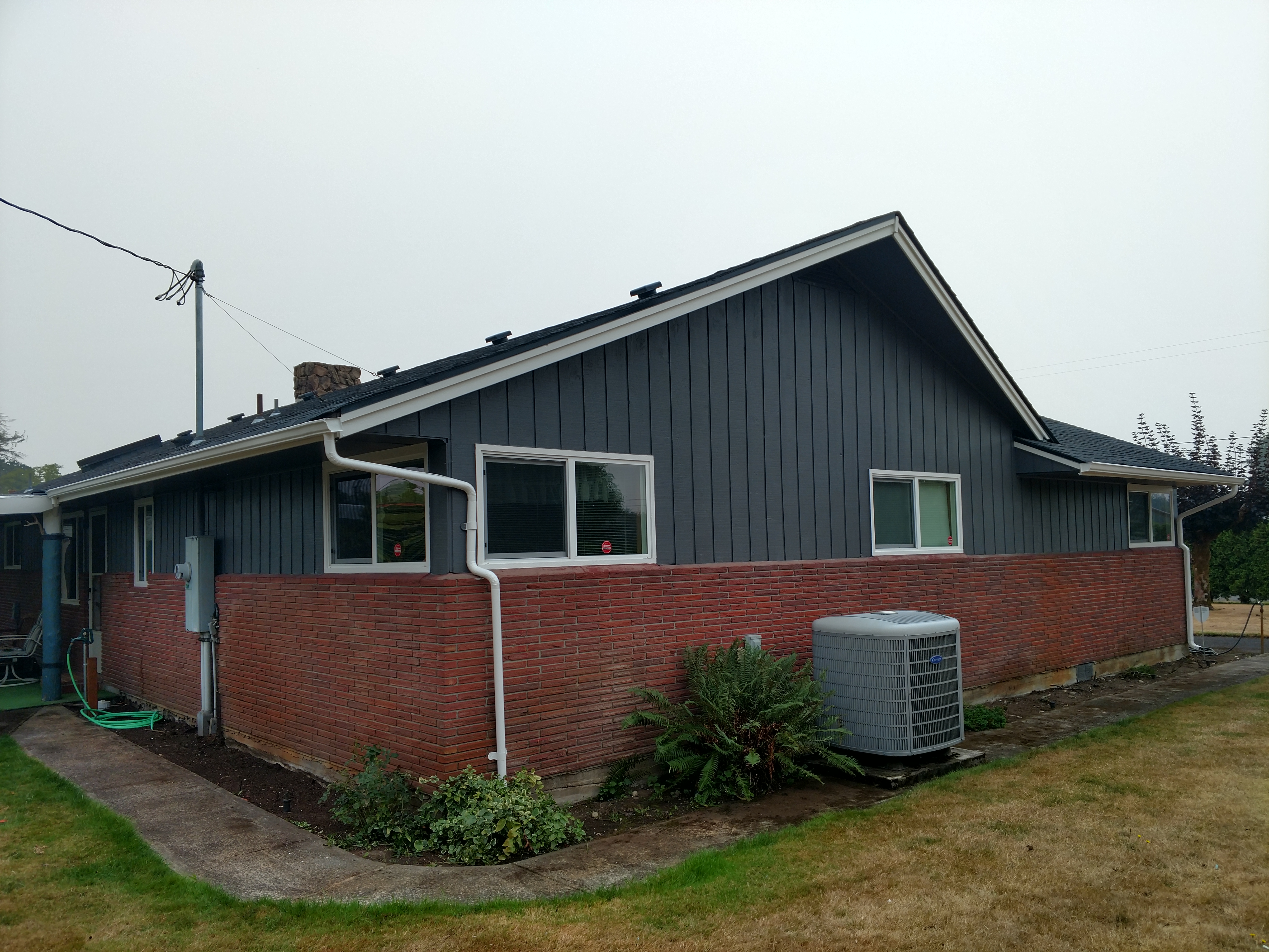 Before: home exterior before Gullard Painting