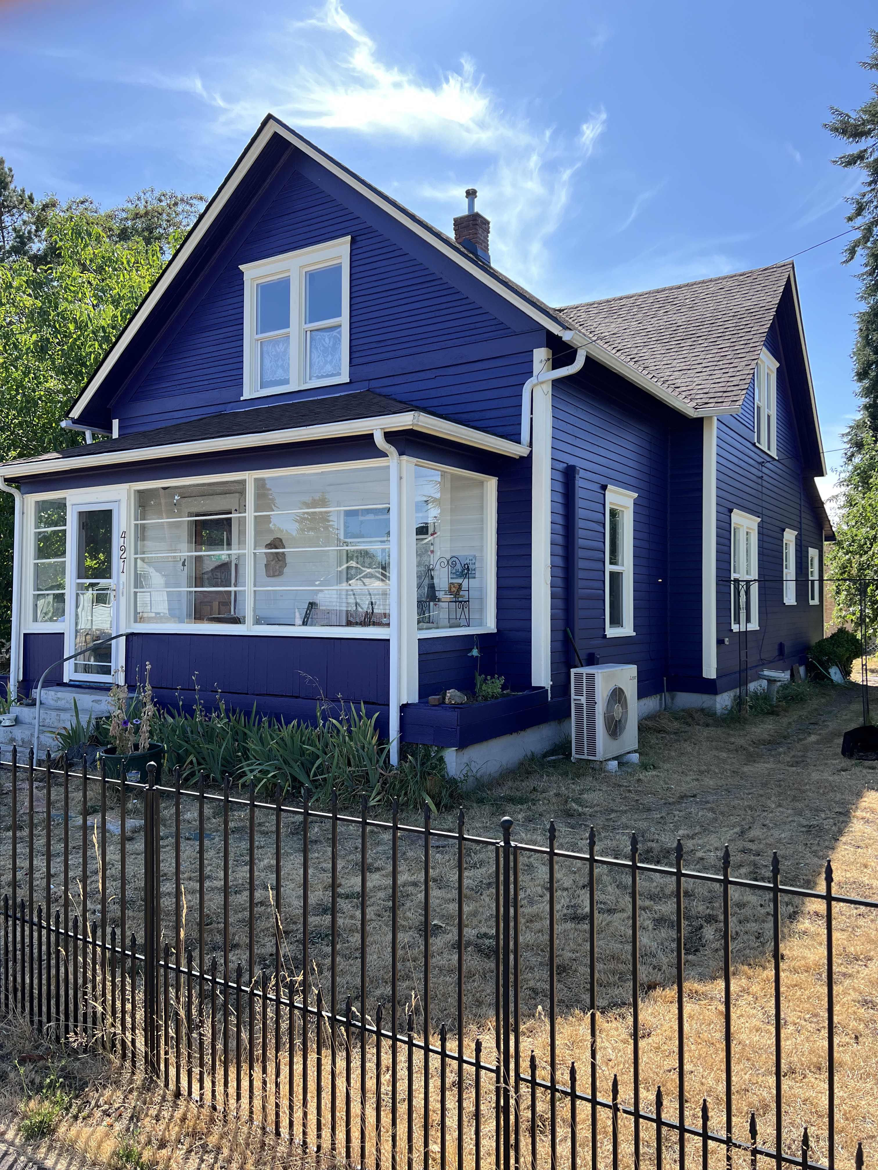 Exterior painting — bold royal blue house by Gullard Painting