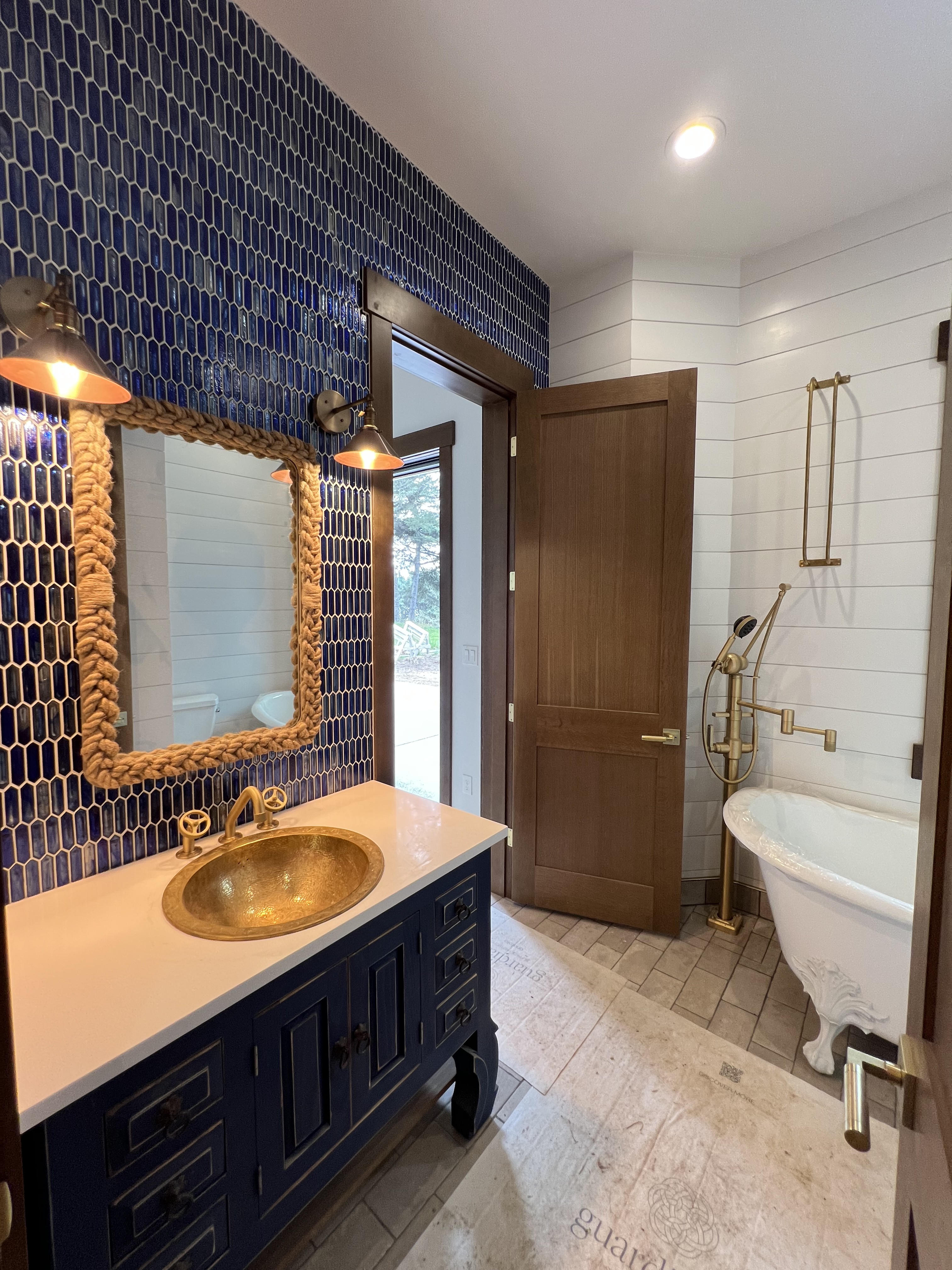 Interior painting — luxury navy bathroom by Gullard Painting